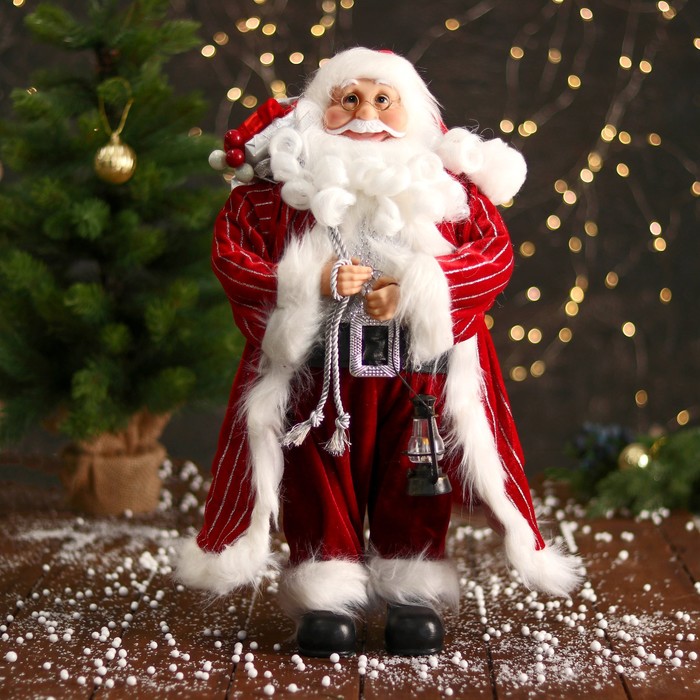 дед мороз в полосатом шарфе и с фонариком 44 см бело красный Дед Мороз В полосатой шубе, фонариком и подарками 47 см, бело-красный