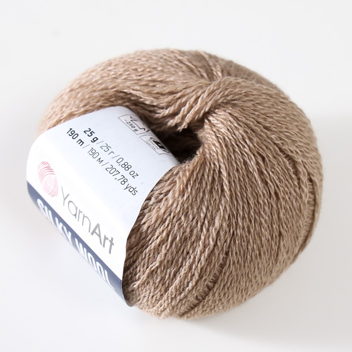 

Пряжа "Silky Wool" 35% силк район, 65% мерино. вул 190м/25г (342 серо-бежевый)