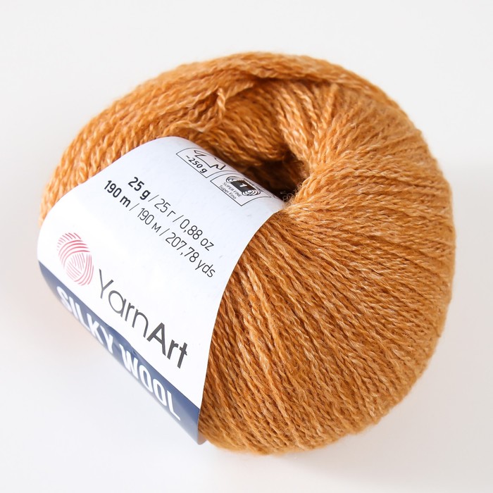 

Пряжа "Silky Wool" 35% силк район, 65% мерино. вул 190м/25г (345 золото)