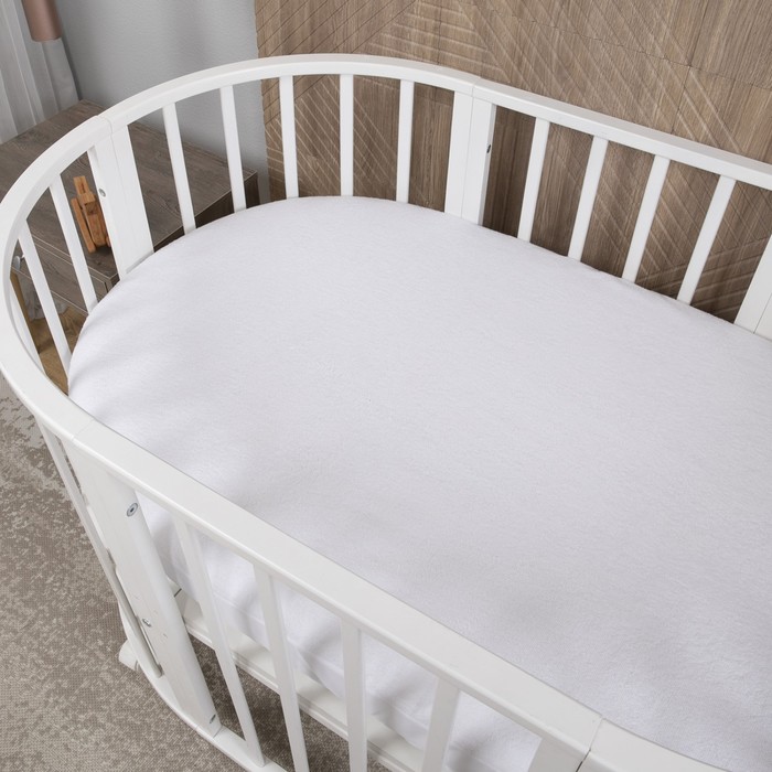 Наматрасник для овальной кроватки, размер 75х125 см, цвет белый