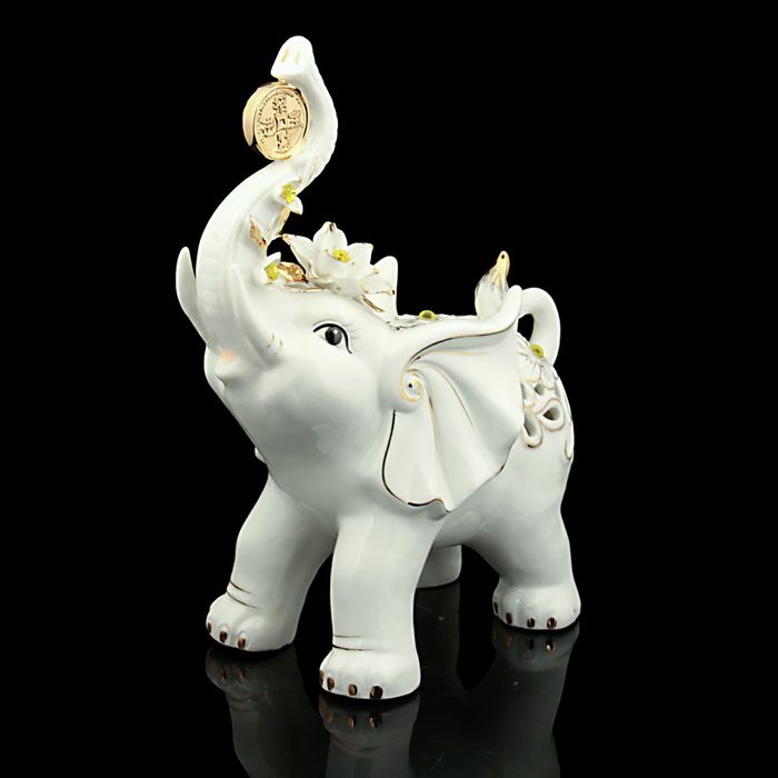 Нэцкэ "Слон с монеткой ажурный"