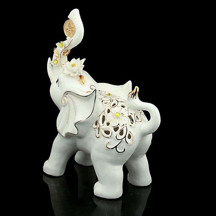 Нэцкэ "Слон с монеткой ажурный"