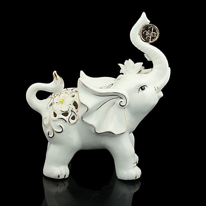 Нэцкэ "Слон с монеткой ажурный"