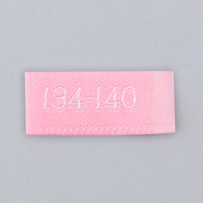 Нашивка текстильная «134-140», 5 х 1.1 см, цвет розовый