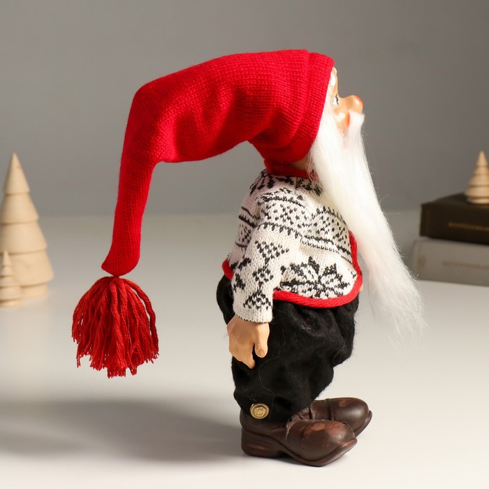 фото Кукла интерьерная "дед мороз в красном колпаке и вязанном свитером в узорах" 29 см