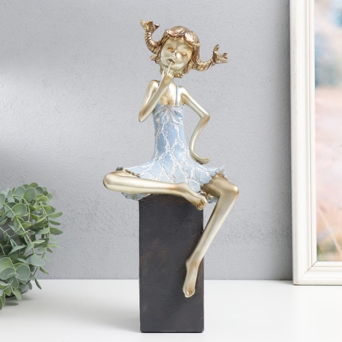 Сувенир полистоун Девочка на кубе, с косичками золото с голубым 16х12х37 см