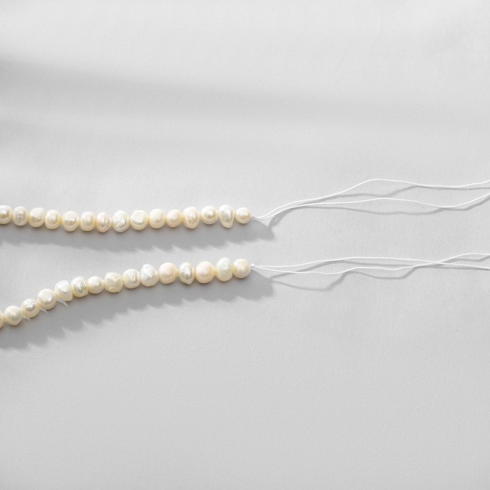 

Бусины на нити "Жемчуг" шар №5-6, цвет белый, 35см