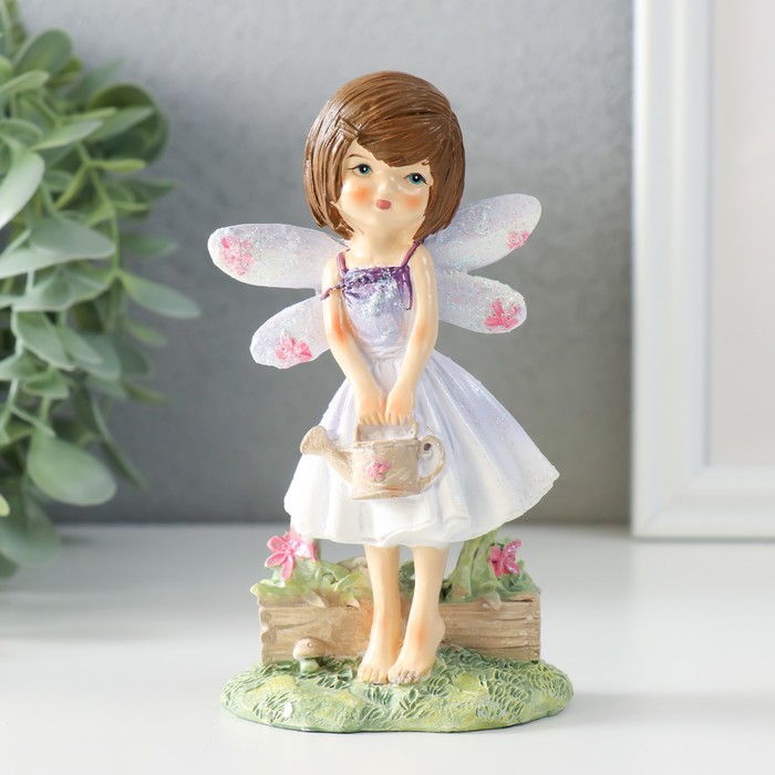

Сувенир полистоун "Малышка в сиреневом платье с крыльями, с леечкой" 7,5х5х13 см