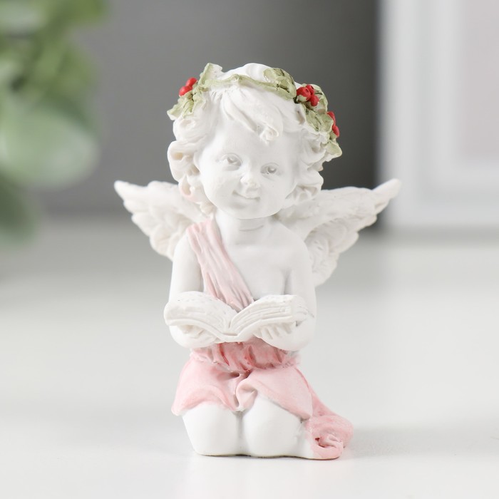 Сувенир полистоун Белоснежный ангел в венке и цветной тоге сидит с книгой 6х4,8х4 см