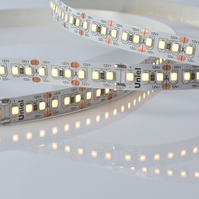 

Светодиодная лента на самоклеящейся основе Uniel, IP20, 5 м, 2835, 180 LED/м, 17 Вт/м, 12 В, 3000К, свечение тёплое белое